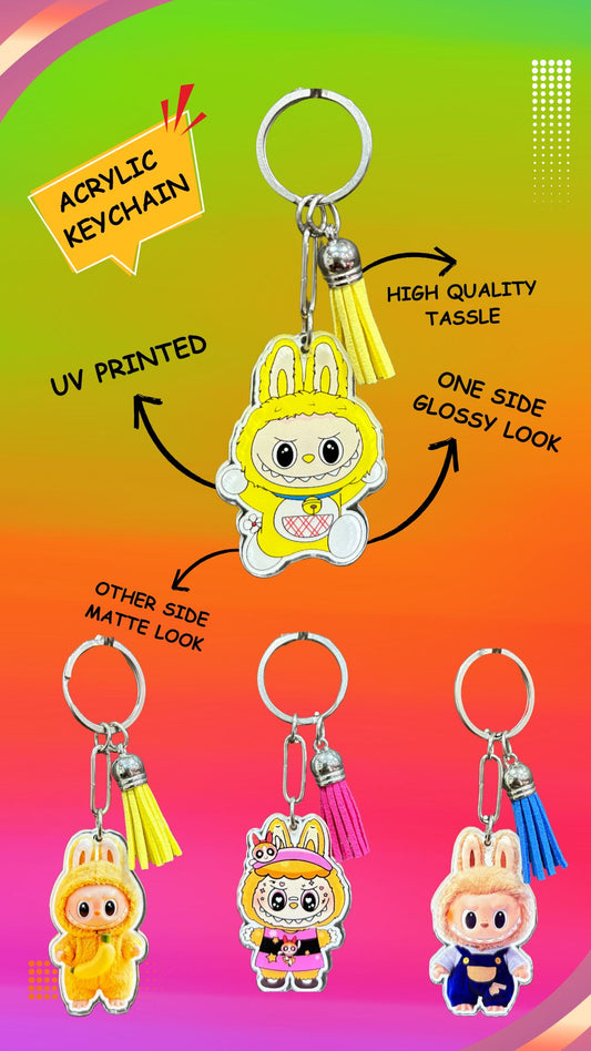Labubu Acrylic Keychains – Set of 4 (Yellow Bunny, Banana Bunny, Pink Outfit Bunny, Farmer Bunny) with Tassel